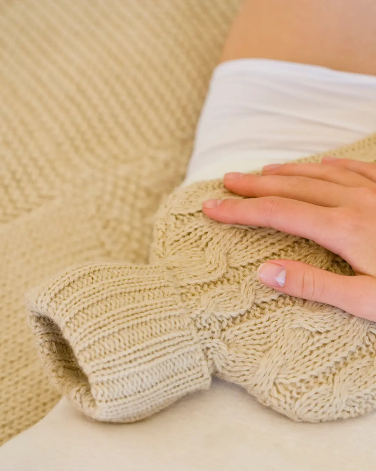 Bouillotte et accessoires bien-être pour accompagner les règles douloureuses et l'endométriose